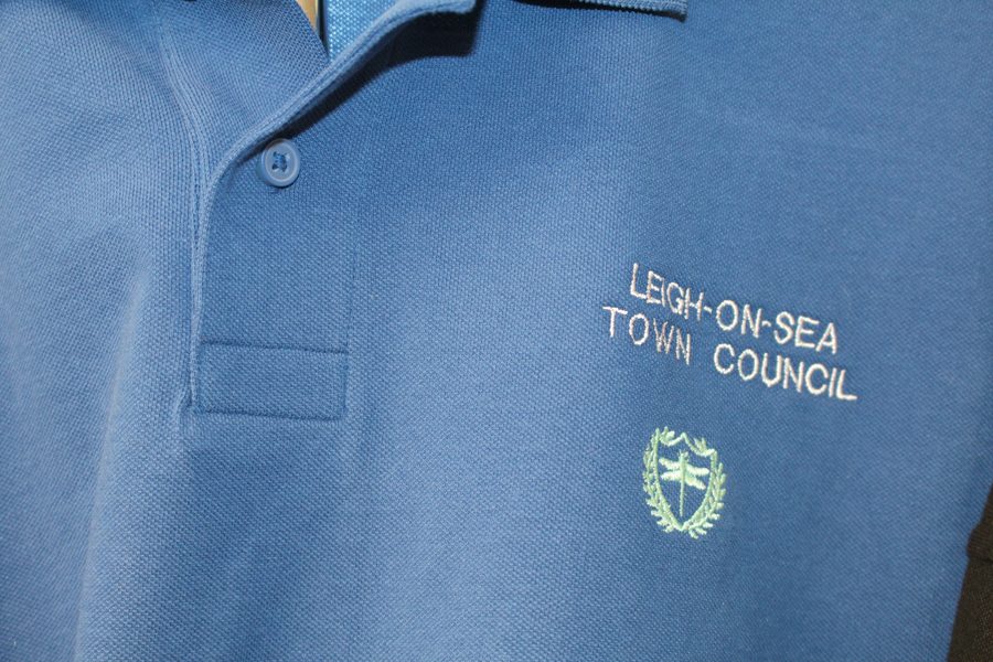 Leigh-on-Sea Town Council name and crest embroidered in white on a blue polo shirt by SVP Southend Embroidery