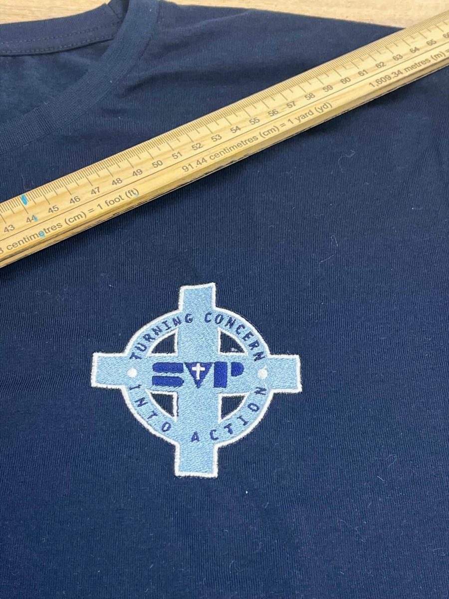 SVP Southend Turning Concern Into Action logo embroidered in blue and white on a navy t-shirt
